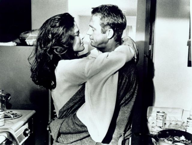 Ali MacGraw (as Carol McCoy) and
Steve McQueen (as Doc McCoy)
early morning embrace